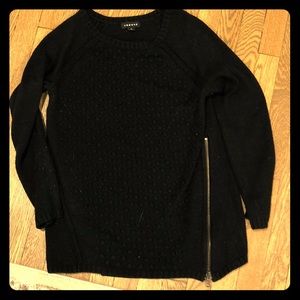 Black textured sweater with zipper detail